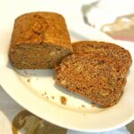 fresh loaf of gluten free zucchini bread cut into slices